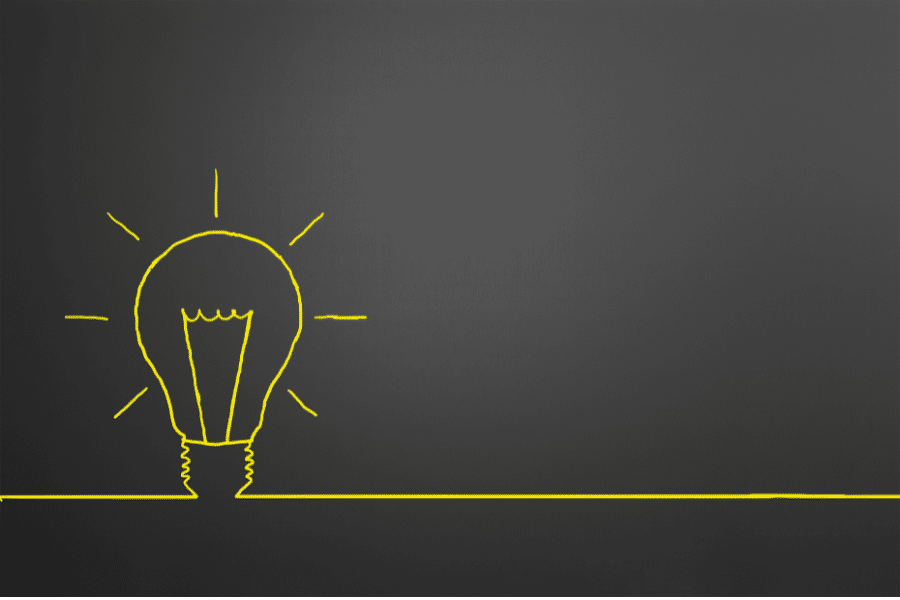Light bulb on blackboard
